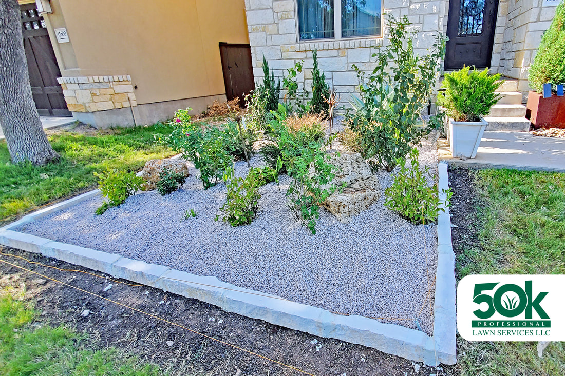 Crushed limestone gravel elegantly laid out in a South Austin residential outdoor space.